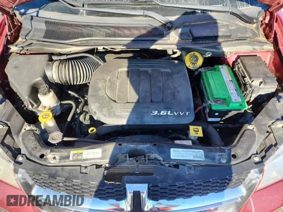 2015 Dodge Grand Caravan SE с VIN 2C4RDGBG6FR600244, выставлен на аукционе Copart как лот 69603865 с пробегом 104 063 миль миль и Чистый • Clean title. История ставок и продаж доступна на DreamBid. Изображение 12.