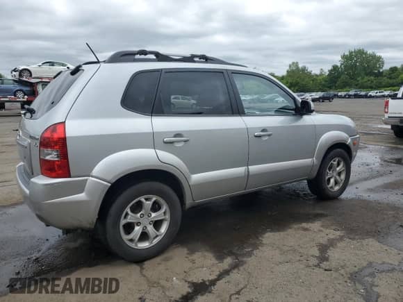 2009 Hyundai Tucson Limited with VIN KM8JN72D19U936404, listed as a Copart auction lot 57335465 with 105,110 mi miles and Salvage title. Bid and sale history available at DreamBid. Image 3.