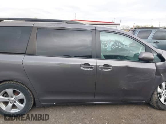 2015 Toyota Sienna LE with VIN 5TDKK3DC9FS582212, listed as a IAAI auction lot 43422573 with 127,449 mi miles and . Bid and sale history available at DreamBid. Image 13.