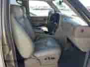 2005 Chevrolet Tahoe LT z VIN 1GNEC13T75R131512, wystawiony jako IAAI lot #43182291 z przebiegiem 231 938 mil mil oraz . Historia ofert i sprzedaży dostępna na DreamBid. Obrazek 5.