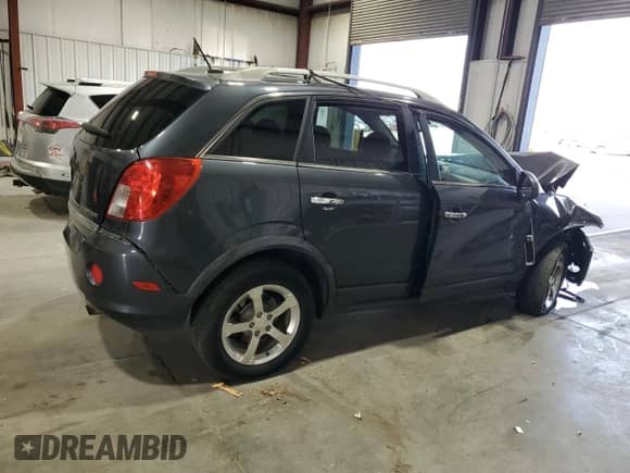 2013 Chevrolet Captiva Sport LT with VIN 3GNAL3EK0DS549162, listed as a Copart auction lot 62727224 with 104,717 mi miles and Salvage title. Bid and sale history available at DreamBid. Image 3.