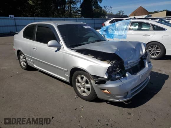 2005 Hyundai Accent GLS с VIN KMHCG35C05U331928, выставлен на аукционе Copart как лот 74672614 с пробегом 41 542 миль миль и Списание • Salvage title. История ставок и продаж доступна на DreamBid. Изображение 4.