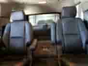 2014 Chevrolet Tahoe LTZ z VIN 1GNSKCE05ER127284, wystawiony jako Copart lot #85735245 z przebiegiem 152 890 mil mil oraz Czysty tytuł • Clean title. Historia ofert i sprzedaży dostępna na DreamBid. Obrazek 10.