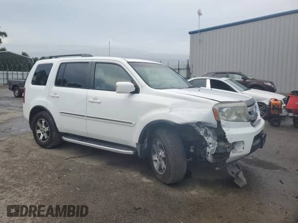 2010 Honda Pilot Touring with VIN 5FNYF4H82AB029490, listed as a Copart auction lot 67353785 with 205,064 mi miles and Salvage title. Bid and sale history available at DreamBid. Image 4.