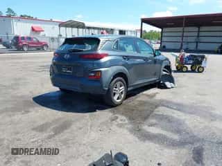 2021 Hyundai Kona SE with VIN KM8K12AA5MU663793, listed as a IAAI auction lot 43153923 with 94,546 mi miles and . Bid and sale history available at DreamBid. Image 4.