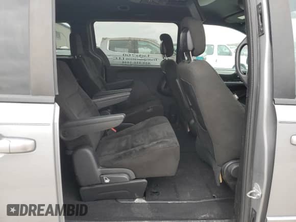 2015 Dodge Grand Caravan SXT with VIN 2C4RDGCG4FR605473, listed as a Copart auction lot 52689925 with 179,966 mi miles and Salvage title. Bid and sale history available at DreamBid. Image 11.