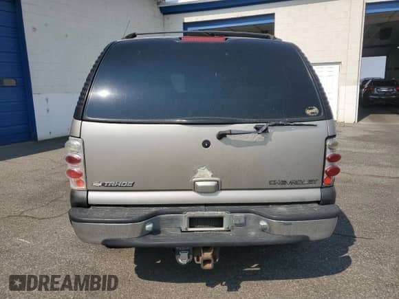 2000 Chevrolet Tahoe LT with VIN 1GNEK13T1YJ189718, listed as a Copart auction lot 80094575 with 180,993 mi miles and Salvage title. Bid and sale history available at DreamBid. Image 6.