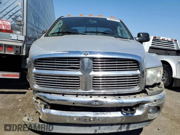 2005 Dodge 3500 SLT with VIN 3D7MS48C65G718422, listed as a Copart auction lot 69870275 with 138,581 mi miles and Salvage title. Bid and sale history available at DreamBid. Image 5.