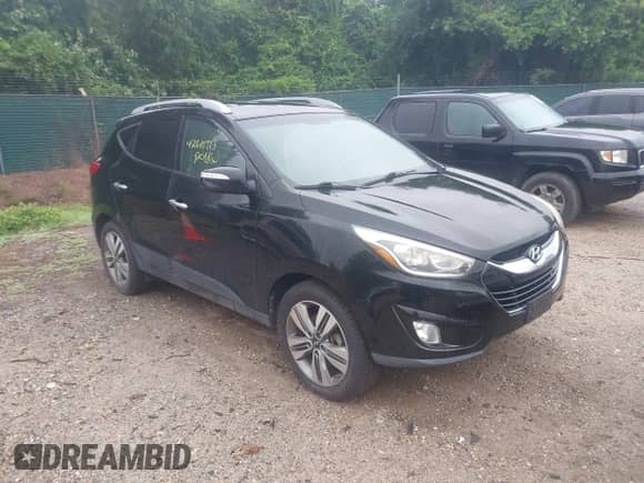 2014 Hyundai Tucson Limited z VIN KM8JU3AG7EU848989, wystawiony jako IAAI lot #42610713 z przebiegiem 175 587 mil mil oraz . Historia ofert i sprzedaży dostępna na DreamBid. Obrazek 1.