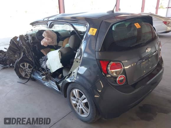 2012 Chevrolet Sonic LS z VIN 1G1JA6SH7C4219017, wystawiony jako IAAI lot #41881402 z przebiegiem Nie podano mil oraz . Historia ofert i sprzedaży dostępna na DreamBid. Obrazek 3.