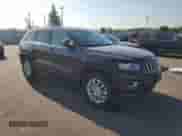 2016 Jeep Grand Cherokee Laredo with VIN 1C4RJFAG2GC379787, listed as a Copart auction lot 84704385 with 112,063 mi miles and Salvage title. Bid and sale history available at DreamBid. Image 4.