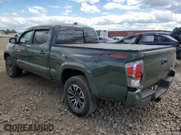 2022 Toyota Tacoma SR5 with VIN 3TMDZ5BN8NM127998, listed as a Copart auction lot 71539915 with 55,895 mi miles and Salvage title. Bid and sale history available at DreamBid. Image 2.