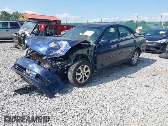 2005 Toyota Camry LE with VIN 4T1BF30K55U105946, listed as a IAAI auction lot 42567700 with Not provided miles and . Bid and sale history available at DreamBid. Image 20.