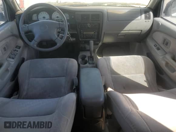 2002 Toyota Tacoma PreRunner z VIN 5TEGM92N82Z052575, wystawiony jako Copart lot #50062815 z przebiegiem 314 154 mil mil oraz Czysty tytuł • Clean title. Historia ofert i sprzedaży dostępna na DreamBid. Obrazek 8.