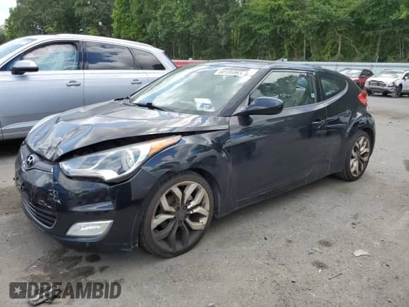 2012 Hyundai Veloster w/Gray Int z VIN KMHTC6AD8CU046631, wystawiony jako Copart lot #68106965 z przebiegiem 120 090 mil mil oraz Szkoda całkowita • Salvage title. Historia ofert i sprzedaży dostępna na DreamBid. Obrazek 1.