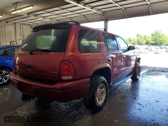 1998 Dodge Durango with VIN 1B4HS28Y5WF100889, listed as a Copart auction lot 57709425 with 261,895 mi miles and Salvage title. Bid and sale history available at DreamBid. Image 3.