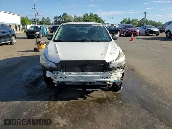 2014 Subaru Impreza 2.0i with VIN JF1GPAA61E9219237, listed as a Copart auction lot 65696885 with 99,895 mi miles and Salvage title. Bid and sale history available at DreamBid. Image 14.