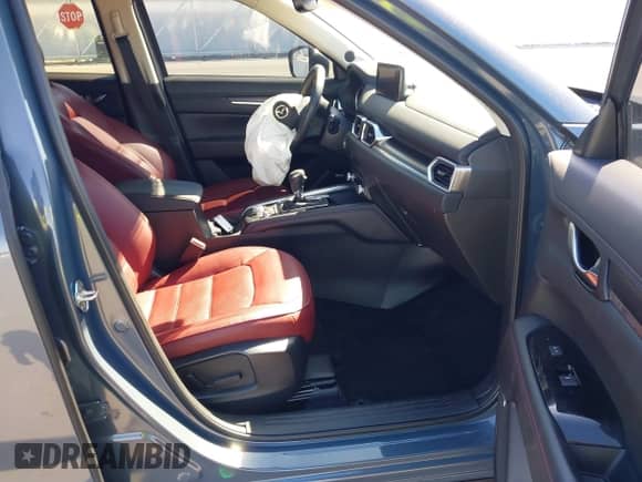 2023 Mazda CX-5 S Preferred z VIN JM3KFBCM4P0289418, wystawiony jako IAAI lot #43404635 z przebiegiem 42 300 mil mil oraz . Historia ofert i sprzedaży dostępna na DreamBid. Obrazek 5.