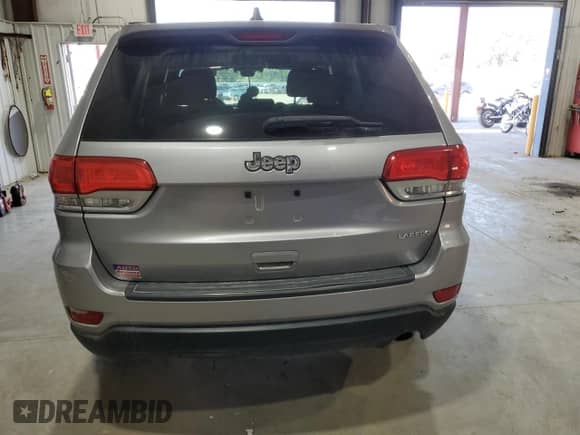 2014 Jeep Grand Cherokee Laredo with VIN 1C4RJEAG5EC255973, listed as a Copart auction lot 71548195 with 106,040 mi miles and Clean title. Bid and sale history available at DreamBid. Image 6.
