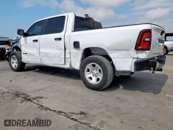 2025 Ram 1500 Tradesman with VIN 1C6RRFGG6SN543501, listed as a Copart auction lot 61486845 with 9,729 mi miles and Salvage title. Bid and sale history available at DreamBid. Image 2.