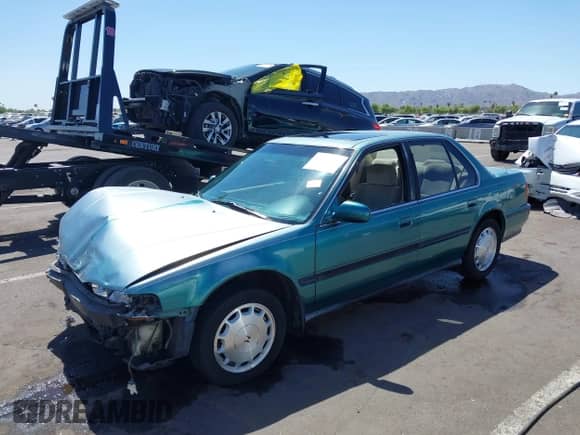 1993 Honda Accord with VIN 1HGCB7678PA087172, listed as a IAAI auction lot 42853056 with 231,990 mi miles and . Bid and sale history available at DreamBid. Image 18.