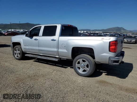 2015 Chevrolet Silverado 2500HD LTZ z VIN 1GC1CWEG9FF140493, wystawiony jako Copart lot #57901495 z przebiegiem 166 225 mil mil oraz Czysty tytuł • Clean title. Historia ofert i sprzedaży dostępna na DreamBid. Obrazek 2.