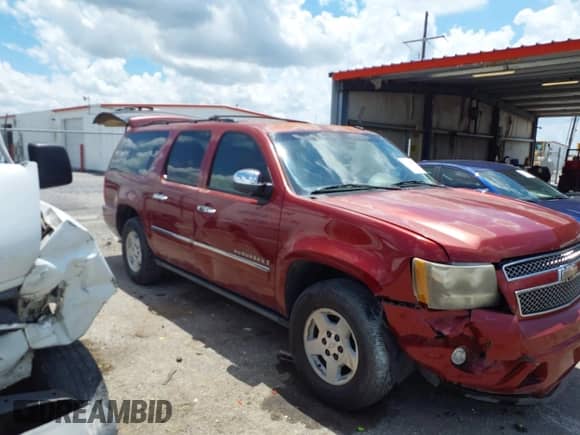 2009 Chevrolet Suburban LTZ z VIN 1GNFK36379J124126, wystawiony jako IAAI lot #42564602 z przebiegiem 210 343 mil mil oraz . Historia ofert i sprzedaży dostępna na DreamBid. Obrazek 13.
