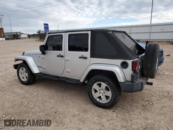 2007 Jeep Wrangler Unlimited Sahara z VIN 1J4GA59167L212909, wystawiony jako Copart lot #82455775 z przebiegiem 124 148 mil mil oraz Czysty tytuł • Clean title. Historia ofert i sprzedaży dostępna na DreamBid. Obrazek 2.