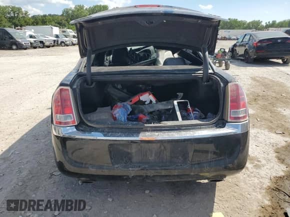 2011 Chrysler 300 Limited с VIN 2C3CA5CG6BH593852, выставлен на аукционе Copart как лот 70000995 с пробегом 163 054 миль миль и Списание • Salvage title. История ставок и продаж доступна на DreamBid. Изображение 6.