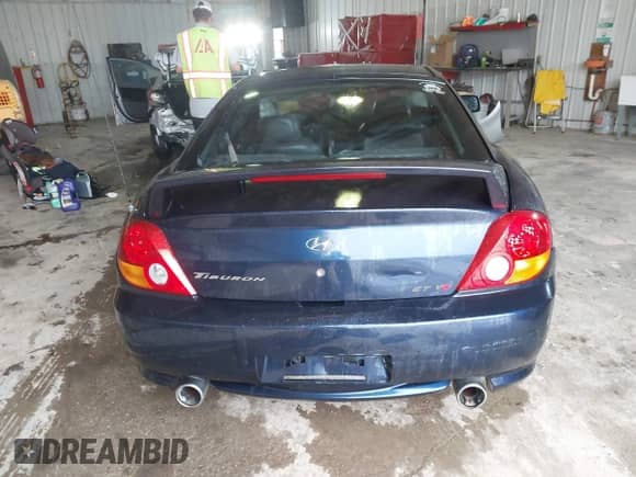 2004 Hyundai Tiburon GT с VIN KMHHN65F64U142304, выставлен на аукционе IAAI как лот 42420996 с пробегом 119 067 миль миль и . История ставок и продаж доступна на DreamBid. Изображение 16.