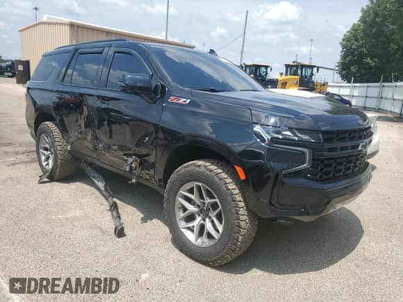 2023 Chevrolet Tahoe Z71 with VIN 1GNSKPKD8PR163245, listed as a Copart auction lot 67031615 with 63,419 mi miles and Salvage title. Bid and sale history available at DreamBid. Image 4.