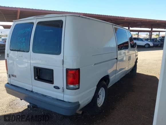1999 Ford Econoline Cargo with VIN 1FTRE14W8XHA92984, listed as a IAAI auction lot 43317343 with 351,272 mi miles and . Bid and sale history available at DreamBid. Image 4.