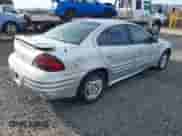 2001 Pontiac Grand Am SE1 with VIN 1G2NF52TX1M560650, listed as a IAAI auction lot 41654339 with 122,885 mi miles and . Bid and sale history available at DreamBid. Image 4.