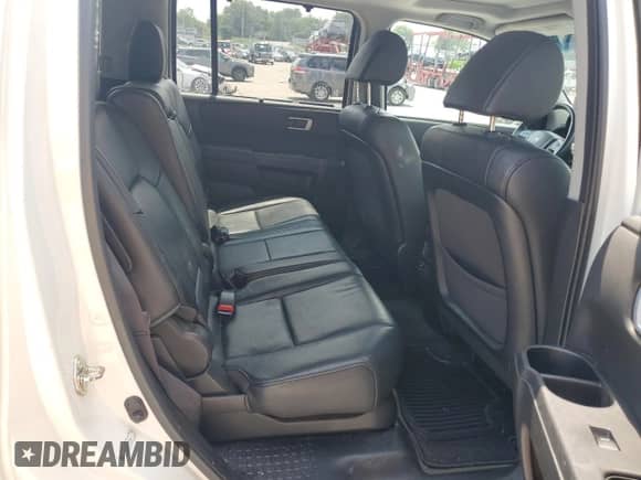 2015 Honda Pilot Touring z VIN 5FNYF4H95FB053508, wystawiony jako Copart lot #68702885 z przebiegiem 157 371 mil mil oraz Czysty tytuł • Clean title. Historia ofert i sprzedaży dostępna na DreamBid. Obrazek 10.