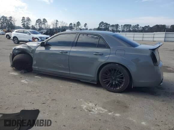 2013 Chrysler 300 C John Varvatos Limited Edition with VIN 2C3CCADT3DH741389, listed as a Copart auction lot 43571135 with 100,892 mi miles and Salvage title. Bid and sale history available at DreamBid. Image 2.