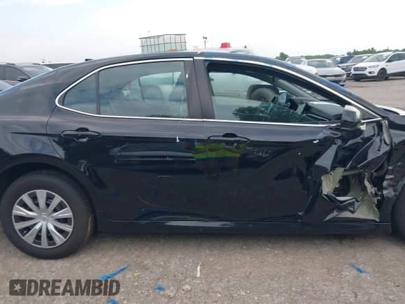 2022 Toyota Camry Hybrid LE with VIN 4T1C31AK3NU585808, listed as a IAAI auction lot 42633297 with 34,066 mi miles and . Bid and sale history available at DreamBid. Image 13.