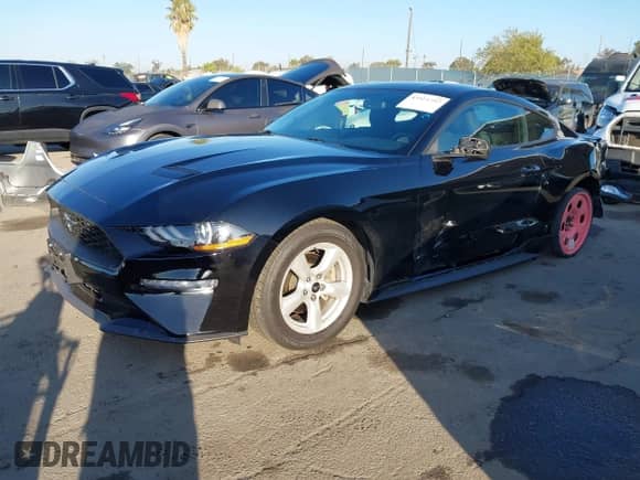 2019 Ford Mustang EcoBoost z VIN 1FA6P8TH0K5169520, wystawiony jako IAAI lot #43511297 z przebiegiem 29 517 mil mil oraz . Historia ofert i sprzedaży dostępna na DreamBid. Obrazek 17.