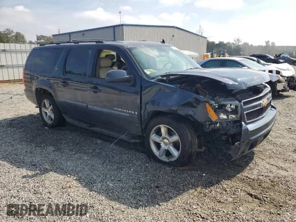 2007 Chevrolet Suburban LS with VIN 1GNFC16087J195534, listed as a Copart auction lot 81477275 with 563,131 mi miles and Salvage title. Bid and sale history available at DreamBid. Image 4.