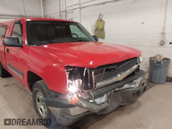 2004 Chevrolet Silverado 1500 Work Truck z VIN 1GCEK14VX4Z338230, wystawiony jako IAAI lot #41947094 z przebiegiem 182 732 mil mil oraz . Historia ofert i sprzedaży dostępna na DreamBid. Obrazek 13.