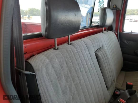 1995 Nissan Frontier z VIN 1N6SD11S9SC362295, wystawiony jako Copart lot #81301345 z przebiegiem 172 154 mil mil oraz Szkoda całkowita • Salvage title. Historia ofert i sprzedaży dostępna na DreamBid. Obrazek 10.