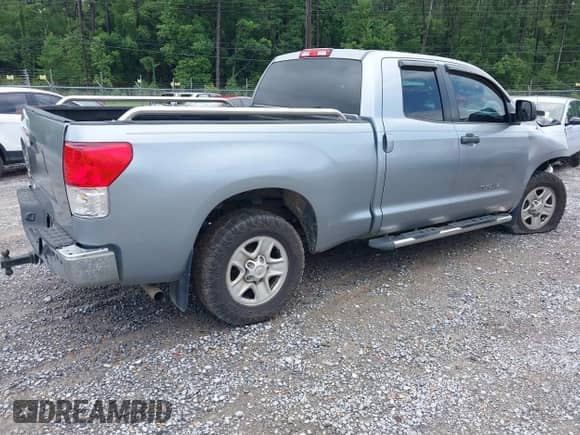 2012 Toyota Tundra z VIN 5TFRU5F14CX027982, wystawiony jako IAAI lot #42369647 z przebiegiem 169 286 mil mil oraz . Historia ofert i sprzedaży dostępna na DreamBid. Obrazek 4.