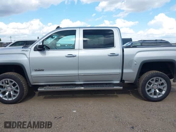 2018 GMC Sierra 1500 SLT z VIN 3GTU2NEC2JG556450, wystawiony jako IAAI lot #42597145 z przebiegiem 122 940 mil mil oraz . Historia ofert i sprzedaży dostępna na DreamBid. Obrazek 14.