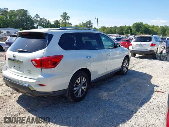 2019 Nissan Pathfinder SV with VIN 5N1DR2MM8KC621063, listed as a IAAI auction lot 42139694 with 129,656 mi miles and . Bid and sale history available at DreamBid. Image 4.