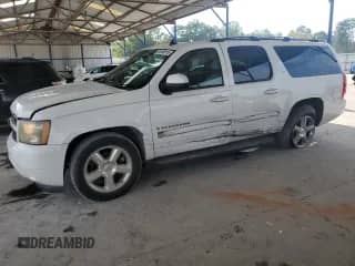 2007 Chevrolet Suburban LT z VIN 3GNFC16J87G107687, wystawiony jako Copart lot #81596915 z przebiegiem 237 431 mil mil oraz Szkoda całkowita • Salvage title. Historia ofert i sprzedaży dostępna na DreamBid. Obrazek 1.