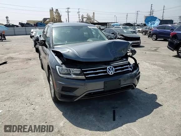 2018 Volkswagen Tiguan S с VIN 3VV1B7AXXJM111786, выставлен на аукционе Copart как лот 68957665 с пробегом 129 625 миль миль и Списание • Salvage title. История ставок и продаж доступна на DreamBid. Изображение 14.