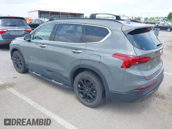 2022 Hyundai Santa Fe XRT with VIN 5NMS64AJ2NH449628, listed as a IAAI auction lot 42729354 with 47,854 mi miles and . Bid and sale history available at DreamBid. Image 3.