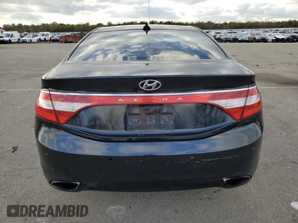 2013 Hyundai Azera с VIN KMHFH4JG3DA221836, выставлен на аукционе Copart как лот 83226124 с пробегом 178 484 миль миль и Списание • Salvage title. История ставок и продаж доступна на DreamBid. Изображение 6.