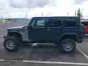 2007 Jeep Wrangler Unlimited Sahara z VIN 1J4GA59107L120503, wystawiony jako IAAI lot #42019384 z przebiegiem 230 965 mil mil oraz . Historia ofert i sprzedaży dostępna na DreamBid. Obrazek 15.