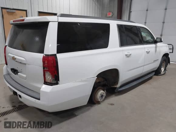 2018 Chevrolet Suburban Commercial with VIN 1GNSKKEC8JR336405, listed as a IAAI auction lot 42201504 with 75,093 mi miles and . Bid and sale history available at DreamBid. Image 4.