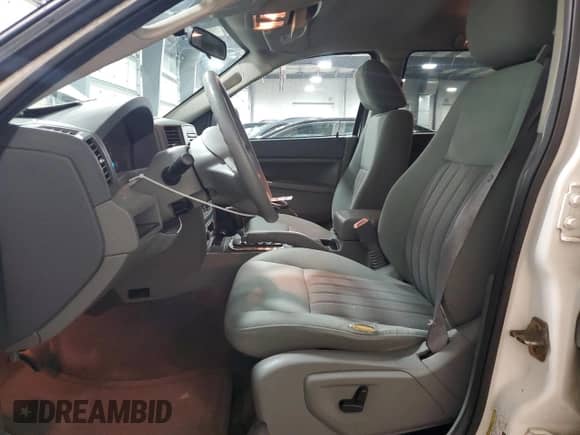 2006 Jeep Grand Cherokee Laredo with VIN 1J4GR48K76C255988, listed as a Copart auction lot 68521495 with 171,036 mi miles and Salvage title. Bid and sale history available at DreamBid. Image 7.